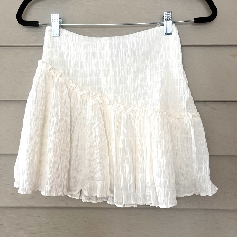 Franceska’s crinkled, cotton, asymmetrical ruffle mini skirt